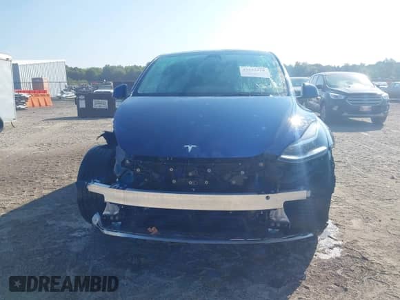 2023 Tesla Model Y Long Range with VIN 7SAYGDEE4PA125024, listed as a IAAI auction lot 43252218 with 21,200 mi miles and . Bid and sale history available at DreamBid. Image 13.