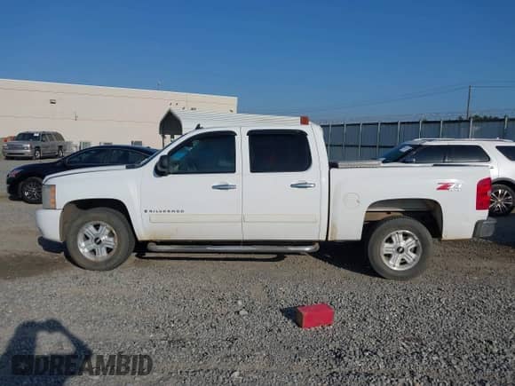 2007 Chevrolet Silverado 1500 LTZ z VIN 2GCEK13M371648855, wystawiony jako IAAI lot #42178802 z przebiegiem 199 481 mil mil oraz . Historia ofert i sprzedaży dostępna na DreamBid. Obrazek 14.