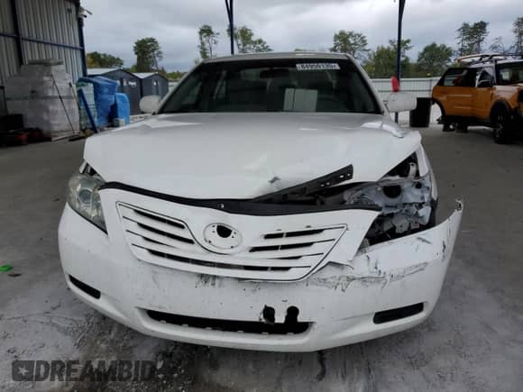 2007 Toyota Camry CE z VIN 4T1BE46K47U567465, wystawiony jako Copart lot #84950135 z przebiegiem 207 166 mil mil oraz Szkoda całkowita • Salvage title. Historia ofert i sprzedaży dostępna na DreamBid. Obrazek 5.