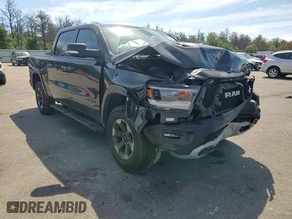2019 Ram 1500 Rebel with VIN 1C6SRFLT0KN698856, listed as a Copart auction lot 69225485 with 143,146 mi miles and Salvage title. Bid and sale history available at DreamBid. Image 13.