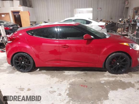 2012 Hyundai Veloster w/Black Int с VIN KMHTC6AD8CU032759, выставлен на аукционе IAAI как лот 41567265 с пробегом 156 973 миль миль и . История ставок и продаж доступна на DreamBid. Изображение 13.