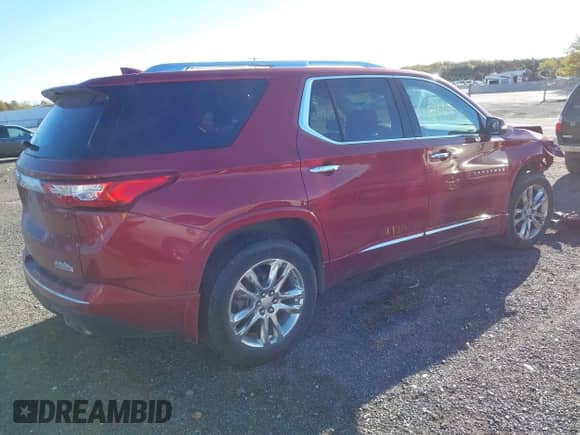 2018 Chevrolet Traverse High Country z VIN 1GNEVKKW1JJ119649, wystawiony jako IAAI lot #43493042 z przebiegiem 92 101 mil mil oraz . Historia ofert i sprzedaży dostępna na DreamBid. Obrazek 4.