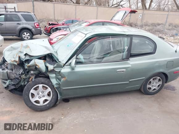 2003 Hyundai Accent GL с VIN KMHCG35C53U256981, выставлен на аукционе IAAI как лот 41317375 с пробегом 73 522 миль миль и . История ставок и продаж доступна на DreamBid. Изображение 14.