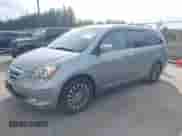 2006 Honda Odyssey Touring with VIN 5FNRL38876B100889, listed as a IAAI auction lot 43293666 with 184,862 mi miles and . Bid and sale history available at DreamBid. Image 2.