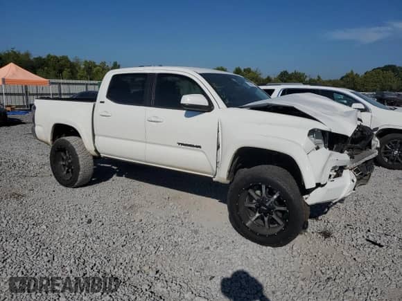 2021 Toyota Tacoma SR5 with VIN 3TYAZ5CN6MT005354, listed as a Copart auction lot 70816115 with 144,733 mi miles and Salvage title. Bid and sale history available at DreamBid. Image 4.