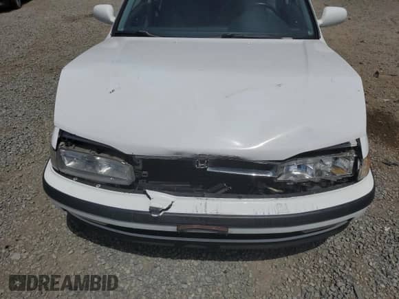 1991 Honda Accord with VIN JHMCB7664MC081955, listed as a Copart auction lot 69637115 with 169,851 mi miles and Salvage title. Bid and sale history available at DreamBid. Image 11.