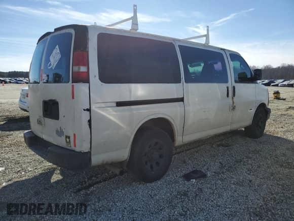 2010 Chevrolet Express Cargo with VIN 1GCUGADX1A1106446, listed as a Copart auction lot 88542695 with 184,062 mi miles and Salvage title. Bid and sale history available at DreamBid. Image 3.