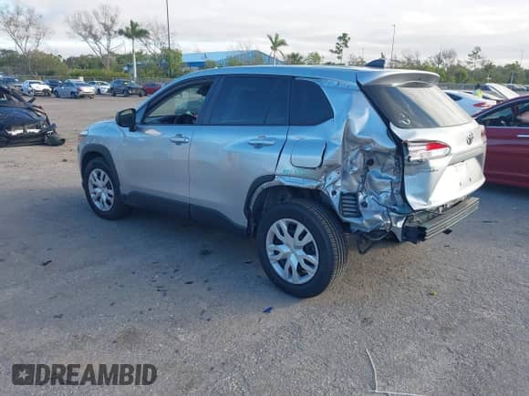 2022 Toyota Corolla Cross L with VIN 7MUAAAAG6NV010688, listed as a IAAI auction lot 41212520 with 50,075 mi miles and . Bid and sale history available at DreamBid. Image 3.