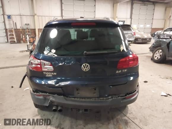 2014 Volkswagen Tiguan SEL with VIN WVGAV3AX8EW563008, listed as a IAAI auction lot 41356523 with 138,211 mi miles and . Bid and sale history available at DreamBid. Image 16.