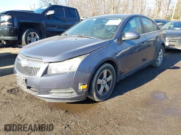 2013 Chevrolet Cruze 1LT with VIN 1G1PD5SB1D7328161, listed as a IAAI auction lot 41360894 with 189,868 mi miles and . Bid and sale history available at DreamBid. Image 2.