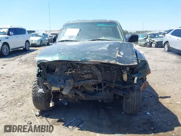2001 Toyota Tacoma с VIN 5TEHN72N71Z801905, выставлен на аукционе IAAI как лот 43175727 с пробегом 302 264 миль миль и . История ставок и продаж доступна на DreamBid. Изображение 12.