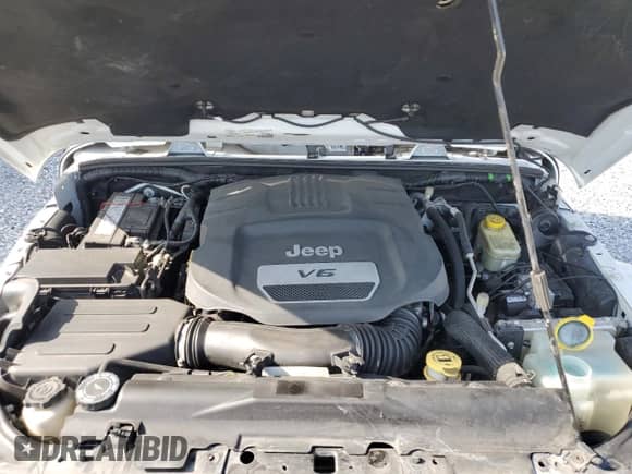 2016 Jeep Wrangler Sahara with VIN 1C4AJWBG4GL234262, listed as a Copart auction lot 58742355 with 133,152 mi miles and Salvage title. Bid and sale history available at DreamBid. Image 12.