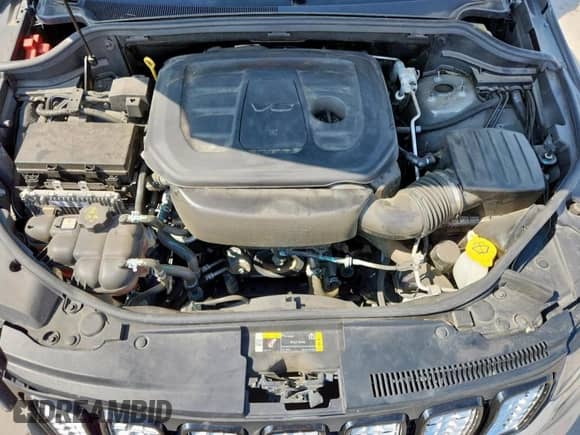 2021 Jeep Grand Cherokee Laredo E with VIN 1C4RJEAG0MC784911, listed as a Copart auction lot 69454845 with 32,334 mi miles and Salvage title. Bid and sale history available at DreamBid. Image 12.