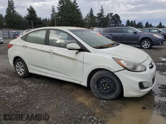 2014 Hyundai Accent GLS z VIN KMHCT4AE8EU656349, wystawiony jako Copart lot #89440825 z przebiegiem 150 288 mil mil oraz Czysty tytuł • Clean title. Historia ofert i sprzedaży dostępna na DreamBid. Obrazek 4.
