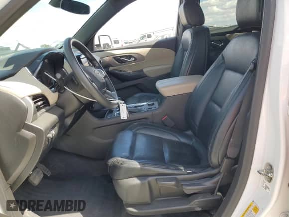2023 Chevrolet Traverse LS with VIN 1GNEVFKW7PJ129795, listed as a Copart auction lot 72059065 with 60,416 mi miles and Salvage title. Bid and sale history available at DreamBid. Image 7.