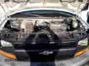2006 Chevrolet Express Passenger z VIN 1GNFG15T061129302, wystawiony jako Copart lot #87262534 z przebiegiem 431 048 mil mil oraz Czysty tytuł • Clean title. Historia ofert i sprzedaży dostępna na DreamBid. Obrazek 12.