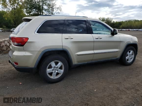 2011 Jeep Grand Cherokee 70th Anniversary with VIN 1J4RR4GGXBC563334, listed as a Copart auction lot 71876355 with 104,989 mi miles and Clean title. Bid and sale history available at DreamBid. Image 3.