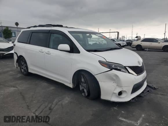 2015 Toyota Sienna SE with VIN 5TDXK3DC4FS663754, listed as a Copart auction lot 65745835 with 100,446 mi miles and Salvage title. Bid and sale history available at DreamBid. Image 4.