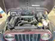 2001 Jeep Wrangler Sahara z VIN 1J4FA59S11P334534, wystawiony jako Copart lot #90651005 z przebiegiem 155 822 mil mil oraz Czysty tytuł • Clean title. Historia ofert i sprzedaży dostępna na DreamBid. Obrazek 12.