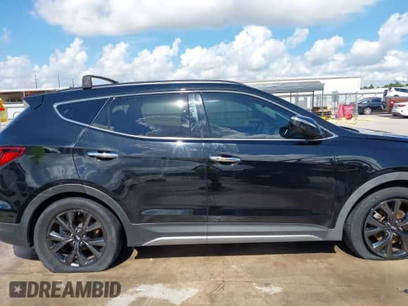 2017 Hyundai Santa Fe Ultimate z VIN 5NMZWDLA1HH039533, wystawiony jako IAAI lot #42591353 z przebiegiem 80 375 mil mil oraz . Historia ofert i sprzedaży dostępna na DreamBid. Obrazek 13.