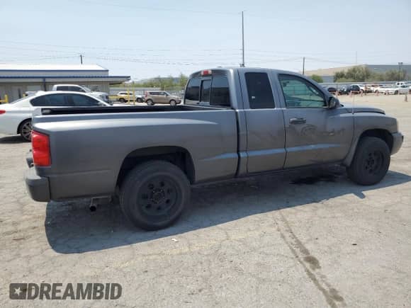 2007 Dodge Dakota SLT with VIN 1D7HE42K27S255960, listed as a Copart auction lot 64684855 with 170,299 mi miles and Salvage title. Bid and sale history available at DreamBid. Image 3.