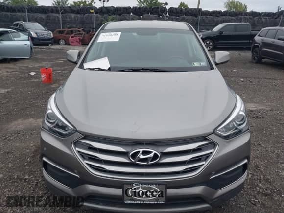 2018 Hyundai Santa Fe 2.4L z VIN 5XYZTDLB4JG526856, wystawiony jako IAAI lot #42998185 z przebiegiem 106 919 mil mil oraz . Historia ofert i sprzedaży dostępna na DreamBid. Obrazek 12.