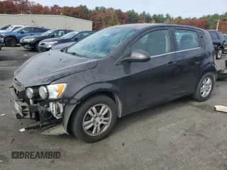 2015 Chevrolet Sonic LT with VIN 1G1JC6SH3F4162359, listed as a Copart auction lot 76879454 with 77,217 mi miles and Salvage title. Bid and sale history available at DreamBid. Image 1.