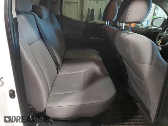 2023 Toyota Tacoma SR5 with VIN 3TYAZ5CN2PT042244, listed as a Copart auction lot 76022534 with 9,551 mi miles and Salvage title. Bid and sale history available at DreamBid. Image 10.