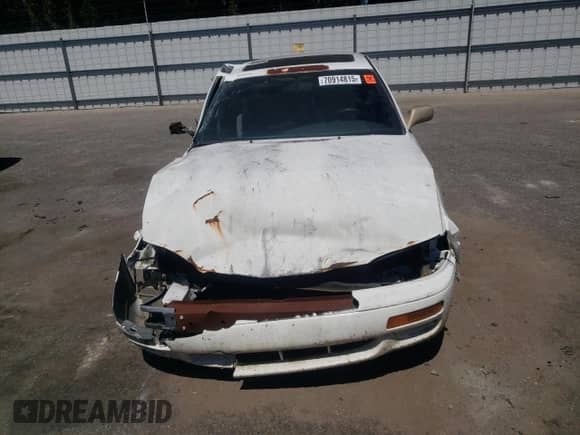 1995 Toyota Camry LE z VIN 4T1GK12E6SU083190, wystawiony jako Copart lot #70914815 z przebiegiem 270 869 mil mil oraz Szkoda całkowita • Salvage title. Historia ofert i sprzedaży dostępna na DreamBid. Obrazek 5.