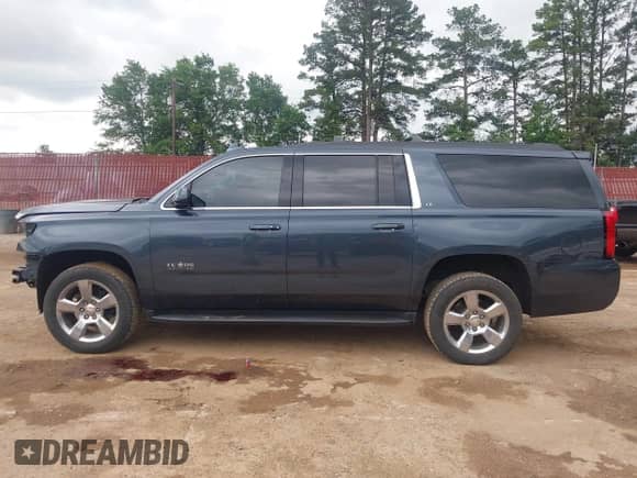 2019 Chevrolet Suburban LT z VIN 1GNSCHKC9KR357351, wystawiony jako IAAI lot #42133855 z przebiegiem 202 919 mil mil oraz . Historia ofert i sprzedaży dostępna na DreamBid. Obrazek 15.