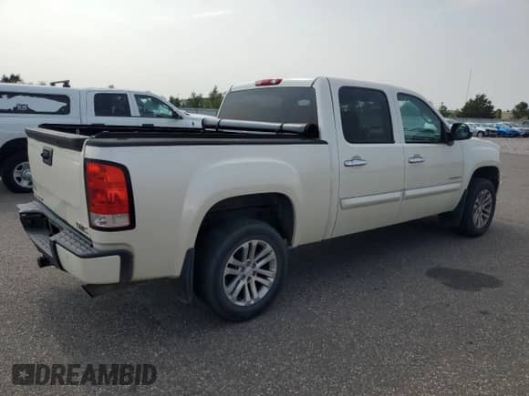2013 GMC Sierra 1500 Denali with VIN 3GTP2XE20DG309190, listed as a Copart auction lot 71746495 with 192,231 mi miles and Salvage title. Bid and sale history available at DreamBid. Image 3.