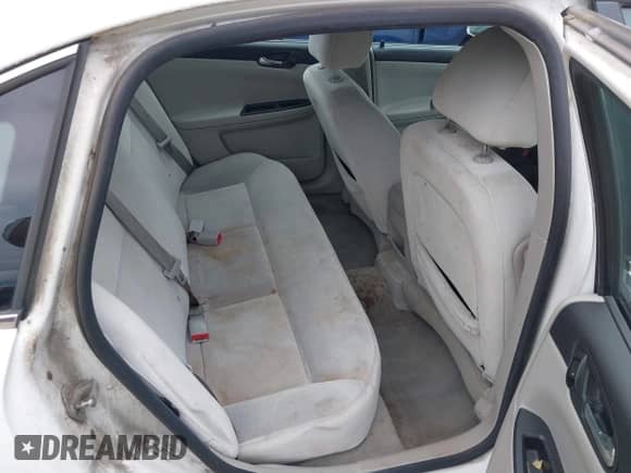 2013 Chevrolet Impala LS with VIN 2G1WA5E34D1170663, listed as a IAAI auction lot 42504812 with 181,057 mi miles and . Bid and sale history available at DreamBid. Image 8.