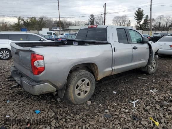 2019 Toyota Tundra SR с VIN 5TFUM5F18KX079687, выставлен на аукционе Copart как лот 46893985 с пробегом 111 149 миль миль и Списание • Salvage title. История ставок и продаж доступна на DreamBid. Изображение 3.