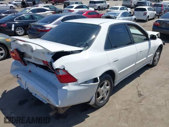 1999 Honda Accord EX with VIN 1HGCG6679XA059196, listed as a IAAI auction lot 43042767 with 256,679 mi miles and . Bid and sale history available at DreamBid. Image 4.