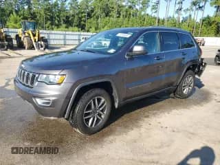 2020 Jeep Grand Cherokee Laredo E with VIN 1C4RJEAG9LC318229, listed as a Copart auction lot 70350665 with 154,160 mi miles and Salvage title. Bid and sale history available at DreamBid. Image 1.