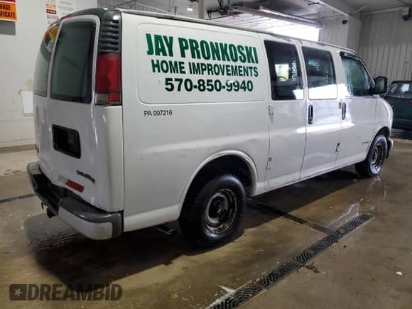 2000 Chevrolet Express Cargo with VIN 1GCFG15W1Y1116497, listed as a Copart auction lot 87206044 with 166,856 mi miles and Salvage title. Bid and sale history available at DreamBid. Image 3.