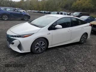 2017 Toyota Prius Premium z VIN JTDKARFP3H3005914, wystawiony jako Copart lot #86251485 z przebiegiem 128 699 mil mil oraz Szkoda całkowita • Salvage title. Historia ofert i sprzedaży dostępna na DreamBid. Obrazek 1.