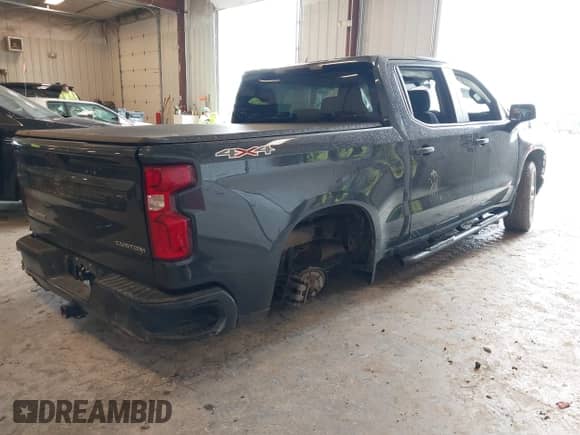 2021 Chevrolet Silverado 1500 Custom with VIN 1GCUYBEF6MZ110183, listed as a IAAI auction lot 42319988 with 81,013 mi miles and . Bid and sale history available at DreamBid. Image 4.