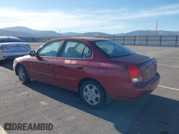 2003 Hyundai Elantra GLS with VIN KMHDN45D23U641116, listed as a IAAI auction lot 42939027 with 149,781 mi miles and . Bid and sale history available at DreamBid. Image 3.