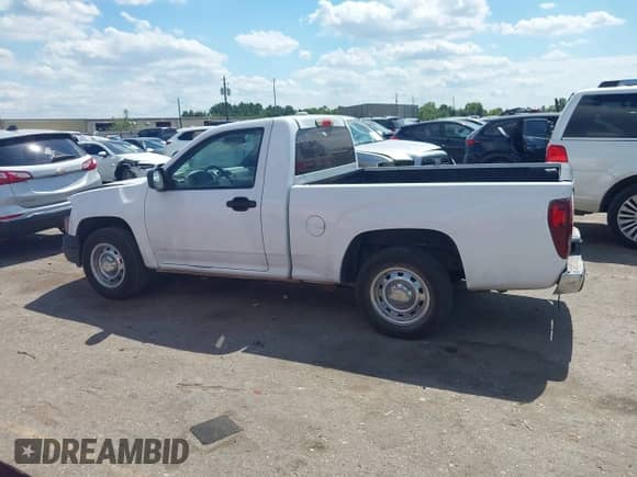2012 Chevrolet Colorado Work Truck z VIN 1GCCSBF9XC8130009, wystawiony jako IAAI lot #43287788 z przebiegiem 151 906 mil mil oraz . Historia ofert i sprzedaży dostępna na DreamBid. Obrazek 13.
