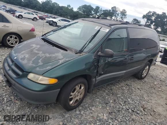 1997 Dodge Caravan SE z VIN 2B4GP44R4VR202585, wystawiony jako Copart lot #68703985 z przebiegiem 188 500 mil mil oraz Szkoda całkowita • Salvage title. Historia ofert i sprzedaży dostępna na DreamBid. Obrazek 1.
