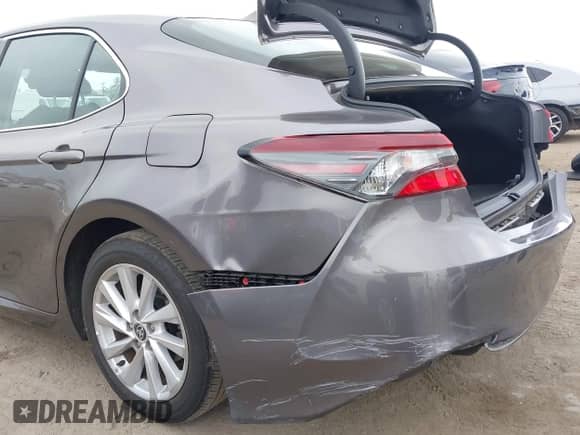 2023 Toyota Camry LE z VIN 4T1C11AKXPU119236, wystawiony jako IAAI lot #43326388 z przebiegiem 23 626 mil mil oraz . Historia ofert i sprzedaży dostępna na DreamBid. Obrazek 20.