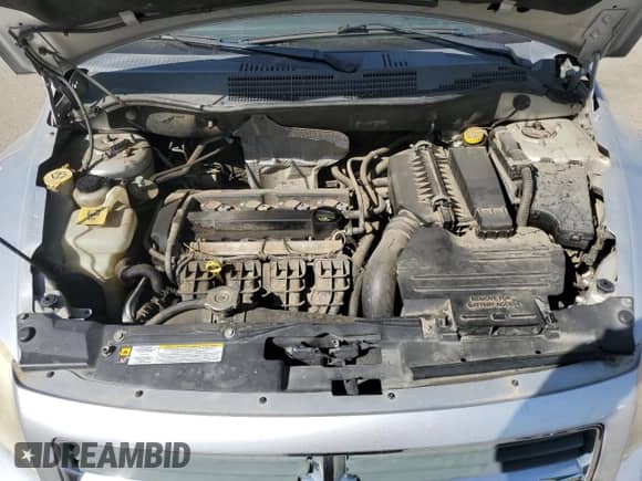 2010 Dodge Caliber SXT z VIN 1B3CB4HAXAD534923, wystawiony jako Copart lot #81126965 z przebiegiem 196 689 mil mil oraz Szkoda całkowita • Salvage title. Historia ofert i sprzedaży dostępna na DreamBid. Obrazek 11.