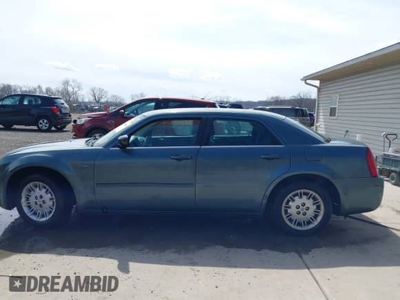 2005 Chrysler 300 300 z VIN 2C3JA43R45H616682, wystawiony jako IAAI lot #41853835 z przebiegiem 158 464 mil mil oraz . Historia ofert i sprzedaży dostępna na DreamBid. Obrazek 14.