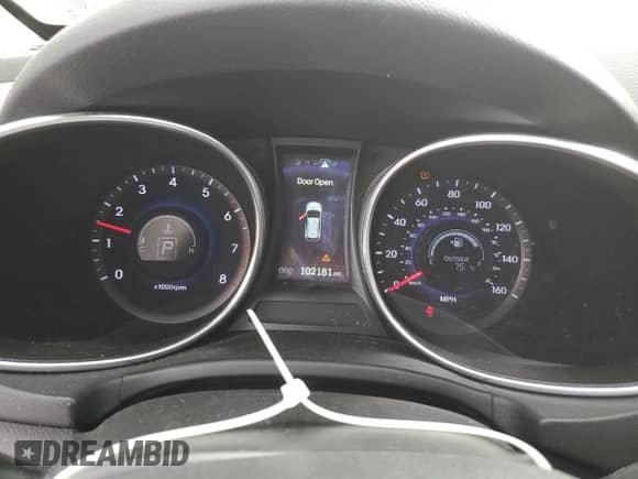2015 Hyundai Santa Fe с VIN 5XYZWDLAXFG254951, выставлен на аукционе Copart как лот 72043145 с пробегом 102 181 миль миль и Списание • Salvage title. История ставок и продаж доступна на DreamBid. Изображение 9.