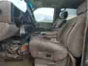 2002 Chevrolet Suburban LT z VIN 1GNFK16Z62J272055, wystawiony jako Copart lot #73710214 z przebiegiem 283 401 mil mil oraz Szkoda całkowita • Salvage title. Historia ofert i sprzedaży dostępna na DreamBid. Obrazek 7.