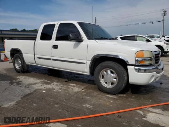 2003 GMC Sierra 1500 SLE with VIN 2GTEC19T031344095, listed as a Copart auction lot 59605215 with 200,891 mi miles and Salvage title. Bid and sale history available at DreamBid. Image 4.