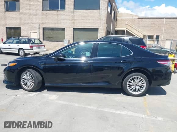 2020 Toyota Camry Hybrid XLE z VIN 4T1F31AK4LU526096, wystawiony jako IAAI lot #42213926 z przebiegiem 102 881 mil mil oraz . Historia ofert i sprzedaży dostępna na DreamBid. Obrazek 15.