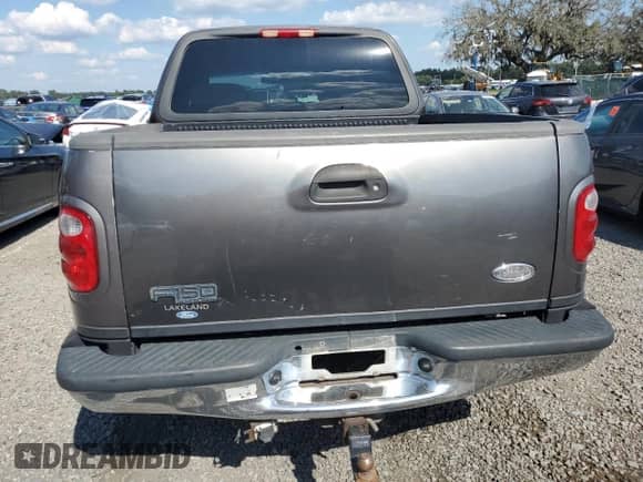 2002 Ford F-150 XLT с VIN 1FTRW07642KC13380, выставлен на аукционе Copart как лот 81409595 с пробегом 251 387 миль миль и Списание • Salvage title. История ставок и продаж доступна на DreamBid. Изображение 6.