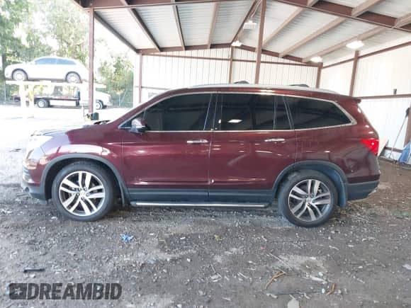 2016 Honda Pilot Touring z VIN 5FNYF6H95GB061170, wystawiony jako IAAI lot #42879963 z przebiegiem 198 451 mil mil oraz . Historia ofert i sprzedaży dostępna na DreamBid. Obrazek 14.